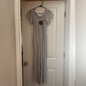 Super stretch medium romper new with tags very flowy